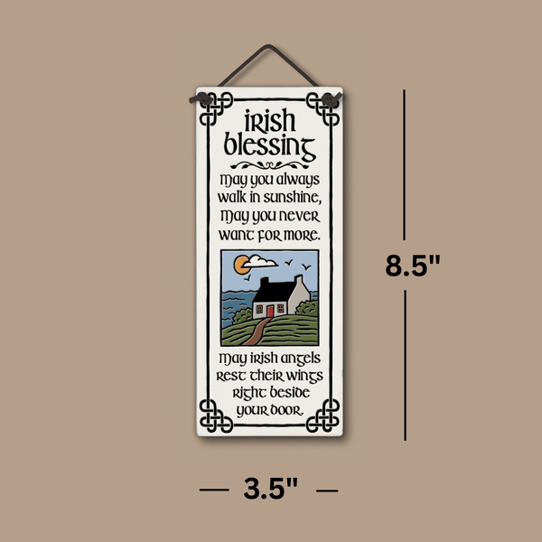 Ceramic tall wall tile with Celtic accents and the Irish Blessing quote, featuring a cottage illustration, shown with dimensions 8.5 inches tall and 3.5 inches wide.