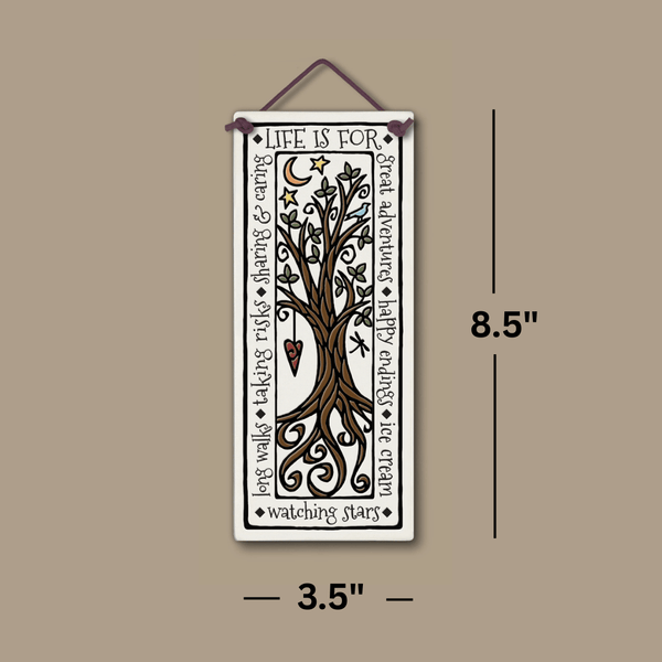Handmade Spooner Creek large tall ceramic tile, 3.5 x 8.5 inches, featuring a whimsical tree with stars, moon, heart charm, and the quote “Life is for great adventures, happy endings, ice cream, watching stars, long walks, taking risks, sharing and caring,” shown with labeled dimensions on a neutral background.