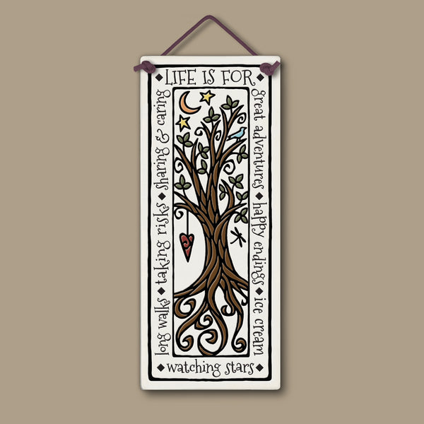 Handmade Spooner Creek large tall ceramic tile, 3.5 x 8.5 inches, featuring a whimsical tree with stars, moon, and heart and the quote “Life is for great adventures, happy endings, ice cream, watching stars, long walks, taking risks, sharing and caring,” displayed on a neutral background.