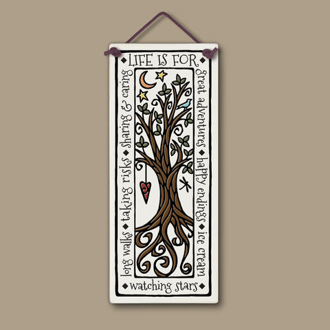 Handmade Spooner Creek large tall ceramic tile, 3.5 x 8.5 inches, featuring a whimsical tree with stars, moon, and heart and the quote “Life is for great adventures, happy endings, ice cream, watching stars, long walks, taking risks, sharing and caring,” displayed on a neutral background.