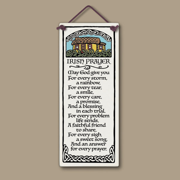 Handmade Spooner Creek large tall ceramic tile, 3.5 x 8.5 inches, featuring a cozy cottage illustration and the traditional Irish Prayer blessing, shown on a neutral background with a hanging cord.