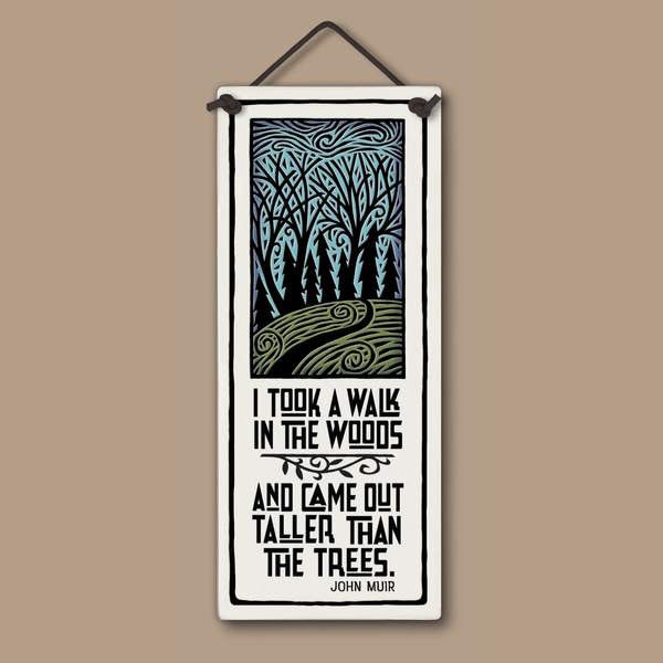 Spooner Creek ceramic tall tile 3.5x8.5 featuring John Muir walk in the woods quote with hand-glazed forest artwork, hanging home décor artisan-made in the USA.