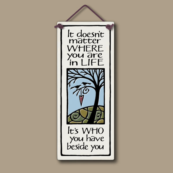 Spooner Creek ceramic tall tile with tree and heart artwork and the quote It doesn’t matter where you are in life it’s who you have beside you, 3.5 x 8.5 inch hanging wall décor.