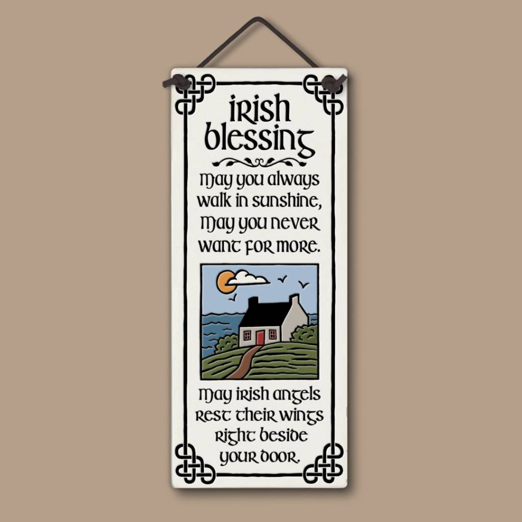 Ceramic tall wall tile with Celtic accents and the Irish Blessing quote, featuring a cottage and landscape illustration.