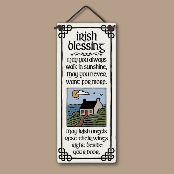 Ceramic tall wall tile with Celtic accents and the Irish Blessing quote, featuring a cottage and landscape illustration.