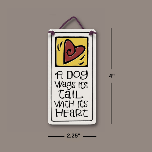 Dimensions of Spooner Creek A Dog Wags Its Tail With Its Heart mini charmer ceramic tile showing 4 inch height and 2.25 inch width with hand-glazed heart artwork and hanging cord