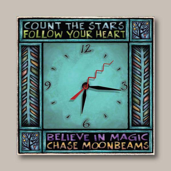 Believe in Magic inspirational quote square wood wall clock by Michael Macone with the quote Count the Stars, Follow Your Heart, Believe in Magic, Chase Moonbeams, and a teal face