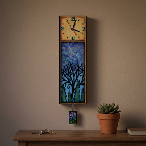 Big Dipper wood wall clock hanging on a living room wall above a console table