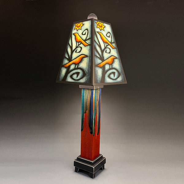 Birds in Tree handmade ceramic table lamp with straight red extruded clay base, nature art shade with birds in tree by Michael Macone, made in Shell Lake Wisconsin