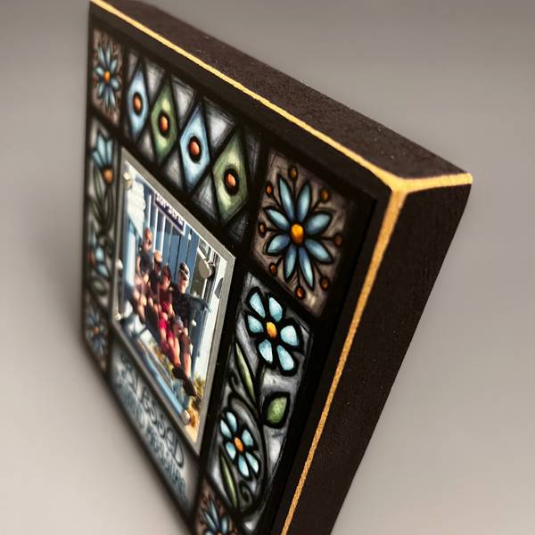 Corner detail of Blessed Beyond Measure quote family picture frame featuring textured Michael Macone artwork and colorful floral design
