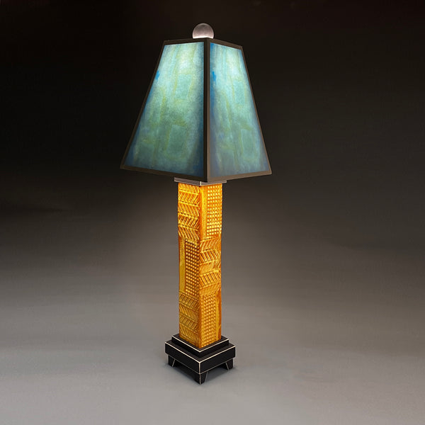 Blue Shade handmade ceramic table lamp with brown stoneware base, glowing aqua and teal color wash shade by Macone Clay, made in Shell Lake Wisconsin