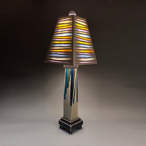 Bright Stripes handmade ceramic table lamp with twisted gray extruded clay base, bold multicolor striped art shade by Michael Macone, made in Shell Lake Wisconsin