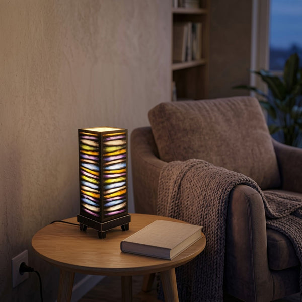 Bright Stripes mood lamp glowing on a bedroom nightstand