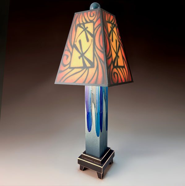 Brown Dragonfly handmade ceramic table lamp with straight blue extruded clay base, warm dragonfly pictograph art shade by Michael Macone, made in Shell Lake Wisconsin

