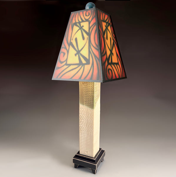 Brown Dragonfly handmade ceramic table lamp with white stoneware base, glowing red and gold dragonfly art shade by Michael Macone, made in Shell Lake Wisconsin