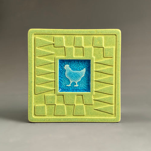 Handmade lime green ceramic chicken coaster with crazed glass center and carved geometric border by Macone Clay
