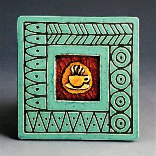 Handmade turquoise ceramic coffee cup coaster with crazed glass center and carved chevron and circle border by Macone Clay