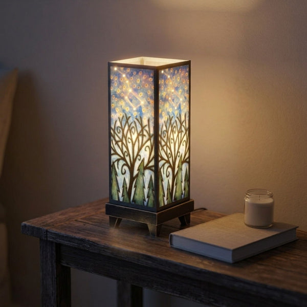 Constellation mood lamp glowing on a bedroom nightstand