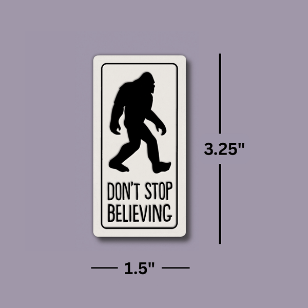Funny Bigfoot Sasquatch ceramic magnet measuring 1.5 x 3.25 inches with “Don’t stop believing” quote, Spooner Creek handmade magnet