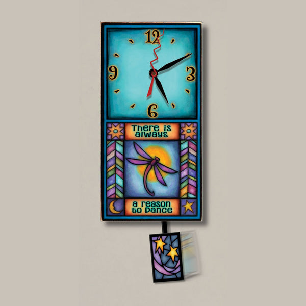 Dragonfly small wood wall clock with pendulum by Michael Macone with the quote There Is Always a Reason to Dance, a purple dragonfly and sun, and a star pendulum