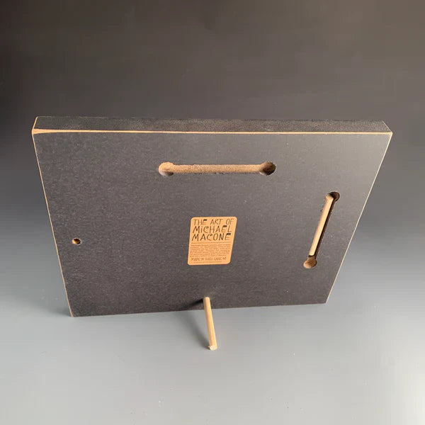 Back of Macone Clay picture frame showing wood construction, peg stand, and wall hanging option
