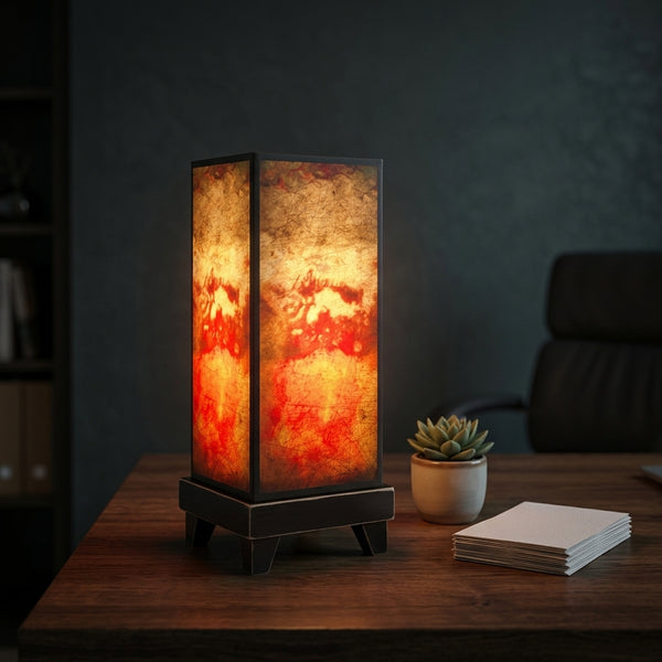 Florence mood lamp glowing on a home office desk
