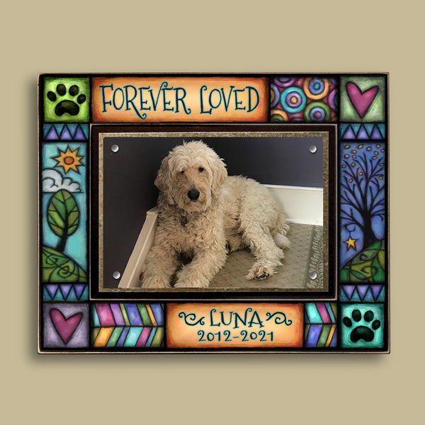 Forever Loved custom pet memorial picture frame with personalized pet name and dates, colorful stained glass inspired paw print and heart artwork by Macone Clay handmade in Shell Lake Wisconsin