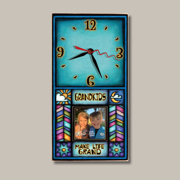 Grandkids Make Life Grand picture frame wood wall clock by Michael Macone with the quote Grandkids Make Life Grand, a turquoise face, and a 2 x 2 photo held by magnets