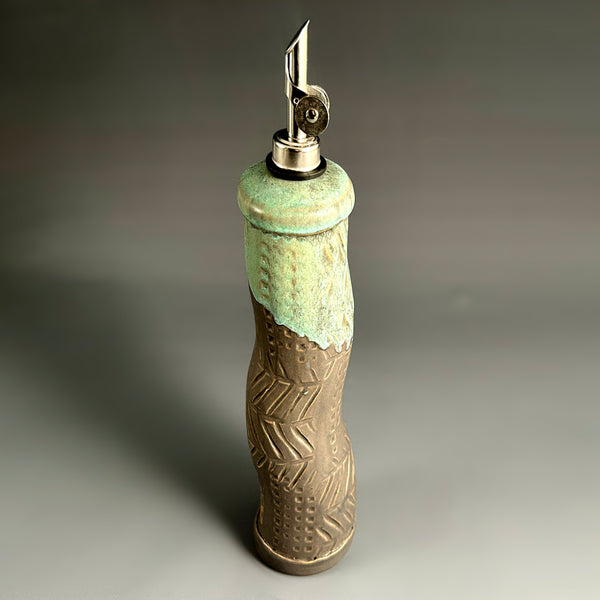 Gray handmade stoneware olive oil cruet with curved pour spout, ceramic oil dispenser by Macone Clay, modern kitchen accessory for cooking