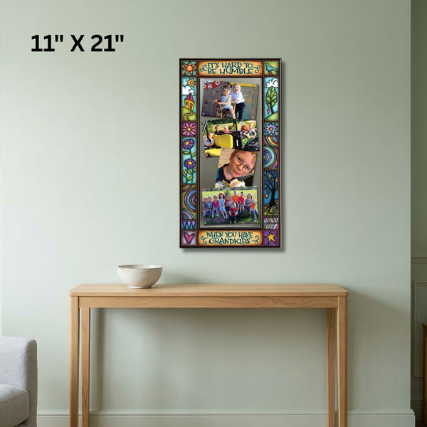 Large multi photo grandkids frame wall display featuring quote It's hard to be humble when you have grandkids with colorful Michael Macone artwork.