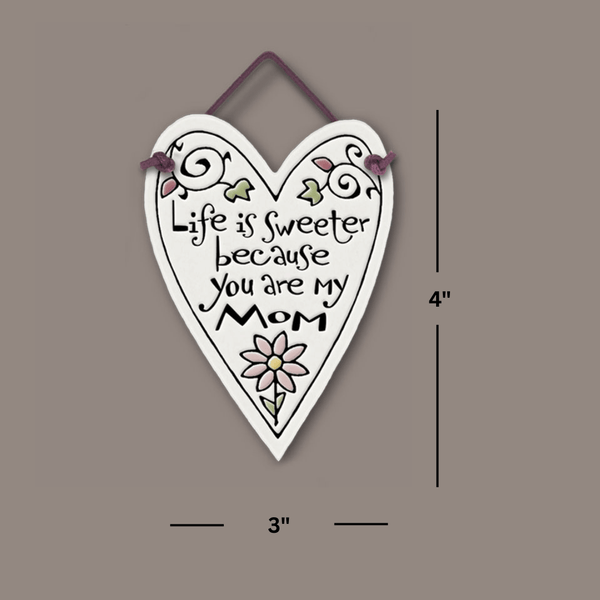 Dimensions image of heart shaped Spooner Creek mini charmer reading “Life is sweeter because you are my mom,” measuring 3 x 4 inches, handmade ceramic wall decor.