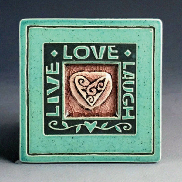 Handmade turquoise ceramic Live Love Laugh heart coaster with crazed glass center by Macone Clay.