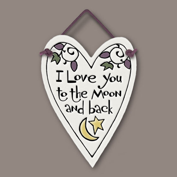Heart shaped Spooner Creek Mini Charmer ceramic tile with quote “I love you to the moon and back,” handmade love gift in Wisconsin.
