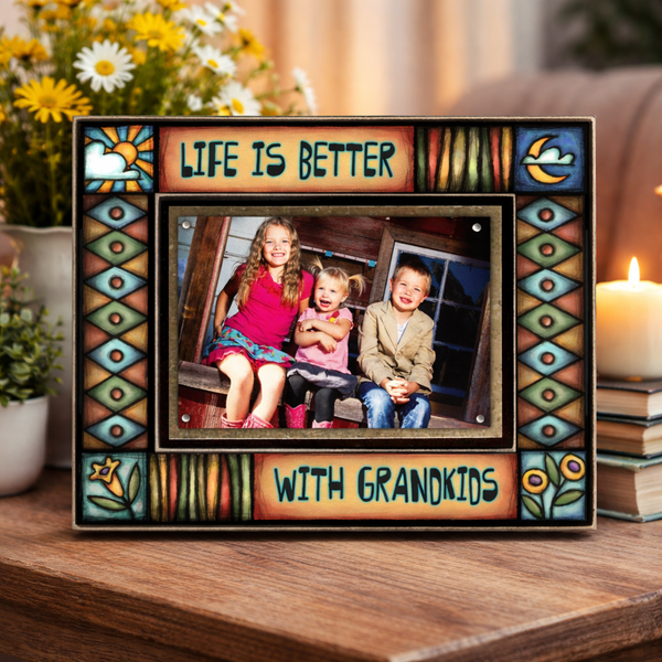 Macone Clay Grandkids Picture Frame 4x6 displayed on table in cozy home setting, colorful folk art grandparent gift decor