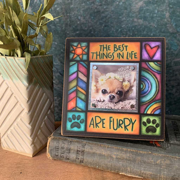 Mini pet picture frame with quote The best things in life are furry, colorful Michael Macone artwork, displayed on stacked books with dog photo, gift for dog or cat lovers
