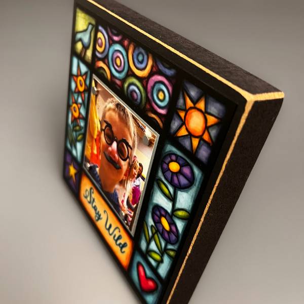 Side view of Stay Wild mini picture frame showing wood frame depth and colorful border design, Macone Clay