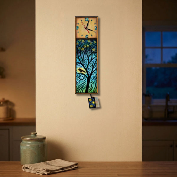 Night Bird Tree wood wall clock hanging on a wall above a kitchen counter