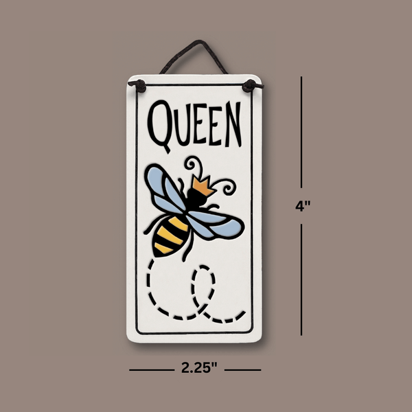 Dimensions of Spooner Creek Queen Bee mini charmer ceramic tile showing 4 inch height and 2.25 inch width with black hanging cord and crowned bee design