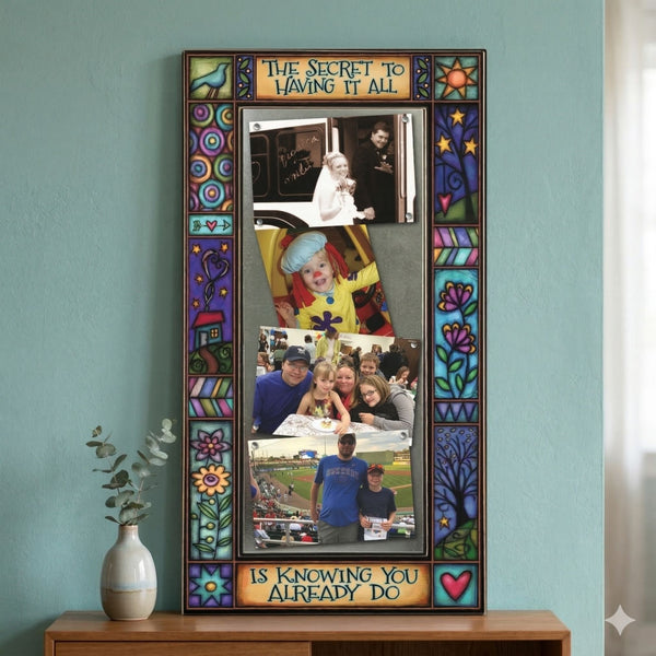 Large multi photo frame wall display featuring quote The secret to having it all is knowing you already do with colorful Michael Macone artwork.