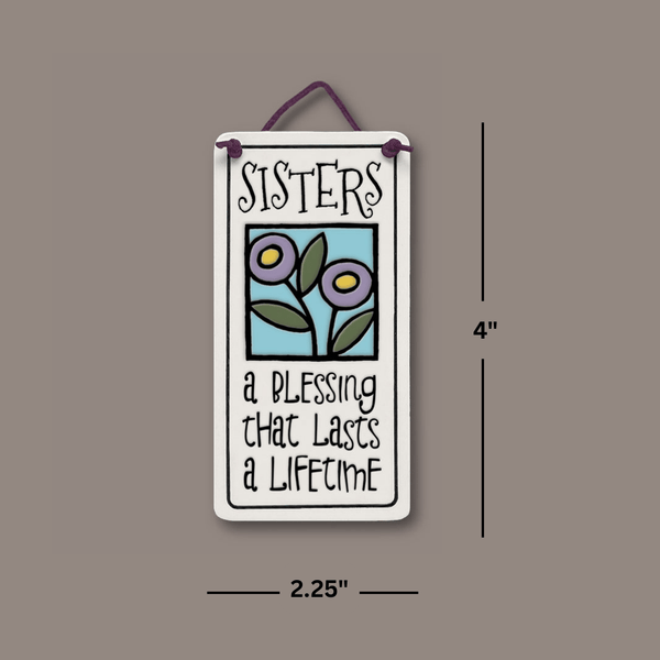 Dimensions of Spooner Creek Sisters A Blessing That Lasts a Lifetime mini charmer ceramic tile showing 4 inch height and 2.25 inch width with hanging cord and floral design