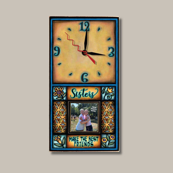 Sisters Make the Best Friends picture frame wood wall clock by Michael Macone with the quote Sisters Make the Best Friends, a golden face, and a 2 x 2 photo held by magnets