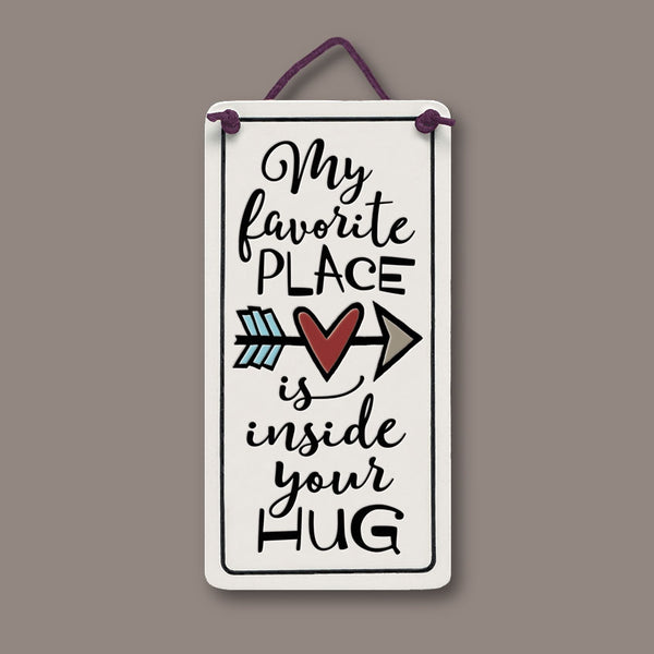 Spooner Creek Mini Charmer ceramic tile with heart and arrow design and quote “My favorite place is inside your hug,” handmade in Wisconsin