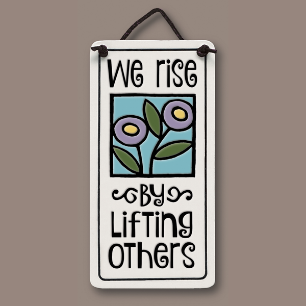 Spooner Creek Mini Charmer ceramic hanging tile with floral artwork and “We rise by lifting others” quote