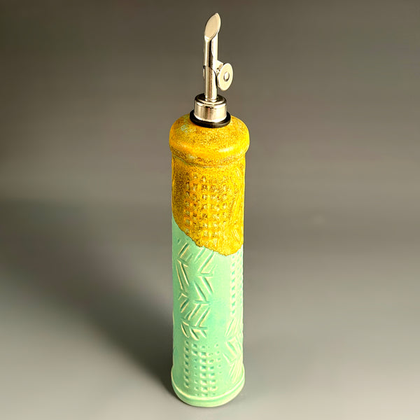Teal handmade stoneware olive oil cruet with straight pour spout, ceramic oil dispenser by Macone Clay, vibrant kitchen accessory for oil use