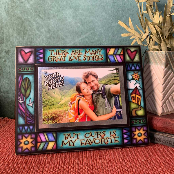 “There are many great love stories but ours is my favorite” quote picture frame by Macone Clay with Michael Macone artwork and magnetic 4 x 6 photo display