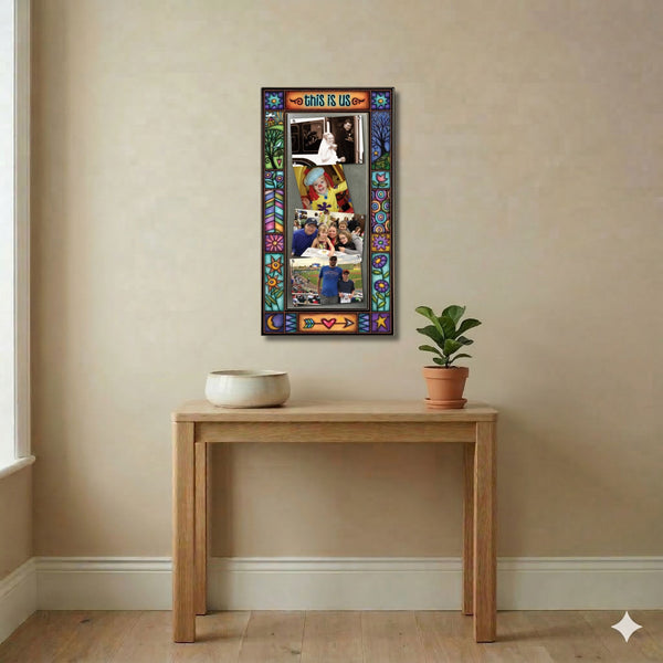 Large multi photo family frame wall display featuring quote This is us with colorful Michael Macone artwork.
