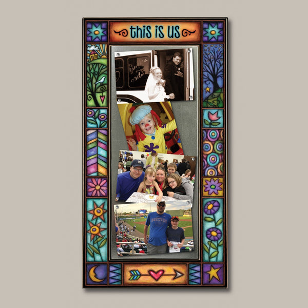 Large multi photo family frame featuring the quote This is us with colorful Michael Macone artwork holding four 4 x 6 family photos.