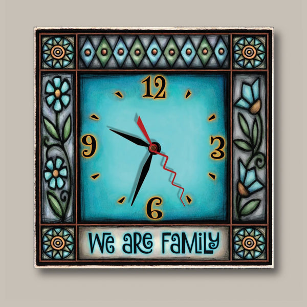 We Are Family turquoise square wood wall clock by Michael Macone with the quote We Are Family, and a border of turquoise flowers, diamonds, and sunburst medallions