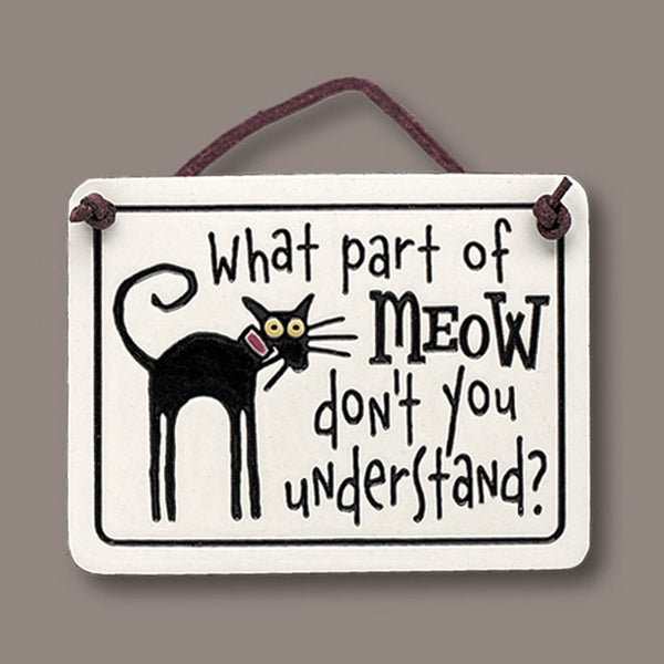 Handmade ceramic mini charmer with funny cat quote “What part of MEOW don’t you understand,” featuring a black cat design and leather like hanging cord.