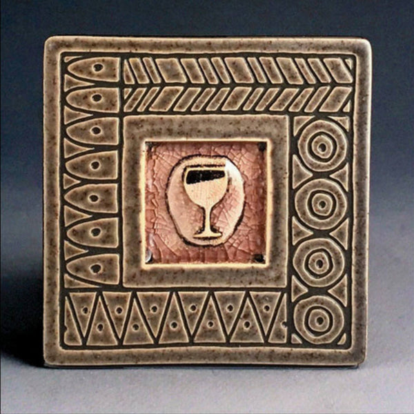 Handmade gray ceramic wine glass coaster with crazed glass center and carved geometric border by Macone Clay